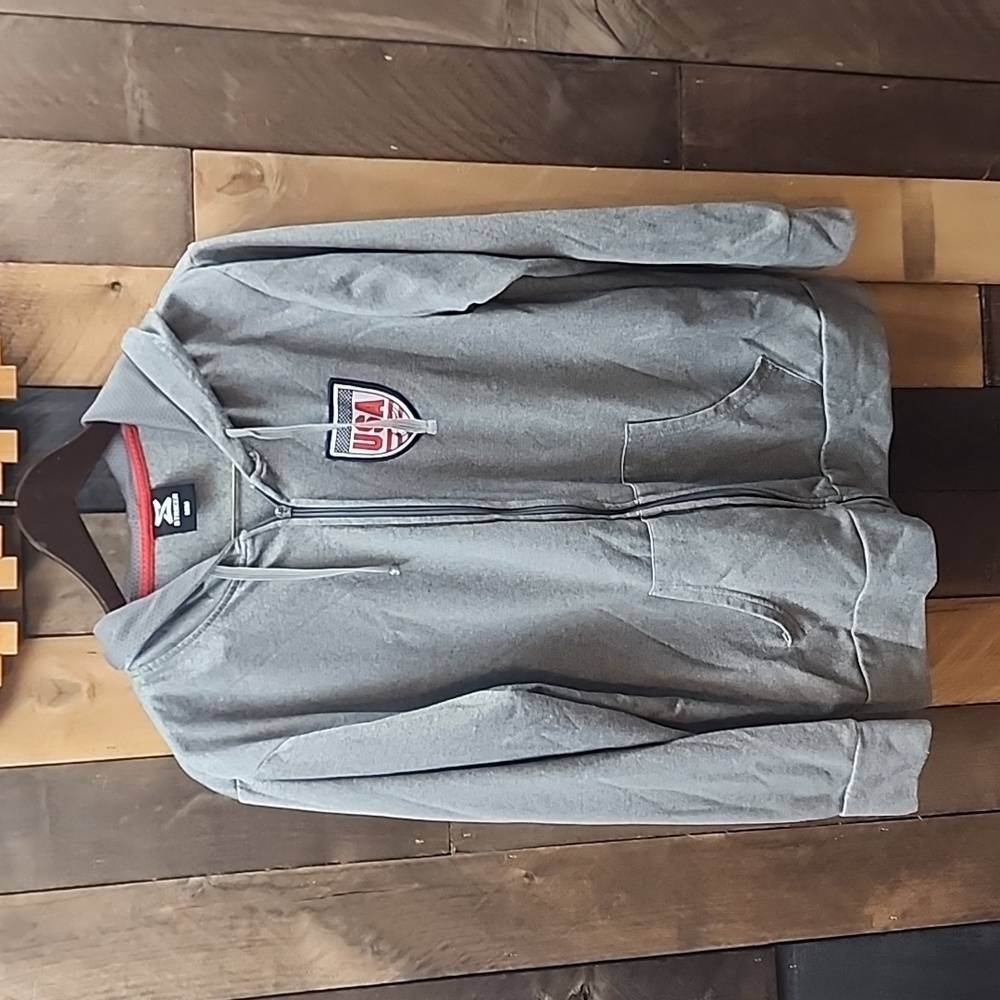 Striker zip up hooded sweatshirt. Size Med